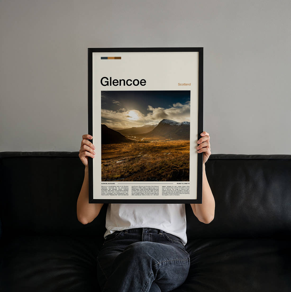 Glencoe Sunlight Over The Valley Travel Print held up by hand to show the size of the print