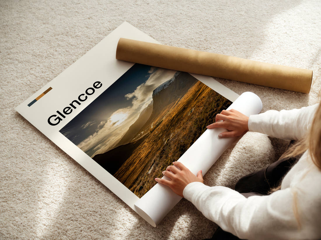 Glencoe Sunlight Over The Valley Travel Print being unrolled from its postal tube