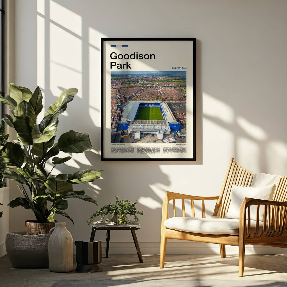 Goodison Park Stadium Print framed on a pale wall beside houseplants