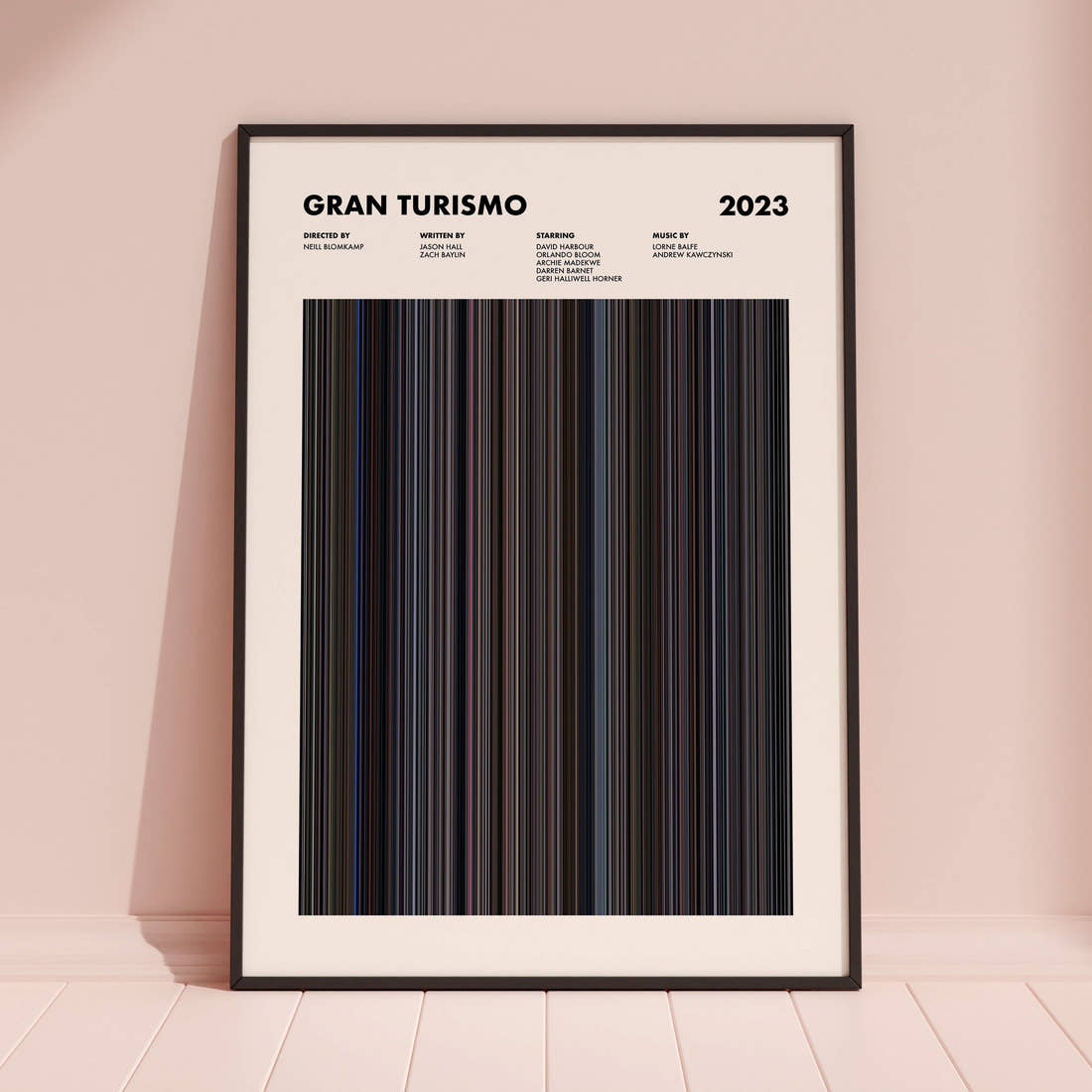 Gran Turismo Movie Barcode Poster framed and leaning against a coloured wall