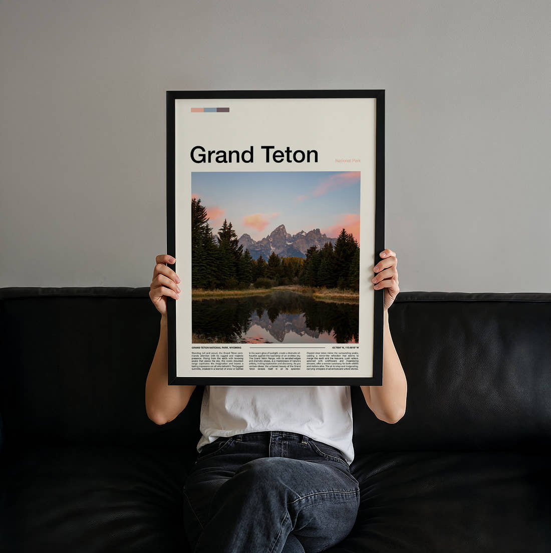 Grand Teton Pines Reflected In The Lake Travel Print held up by hand to show the size of the print