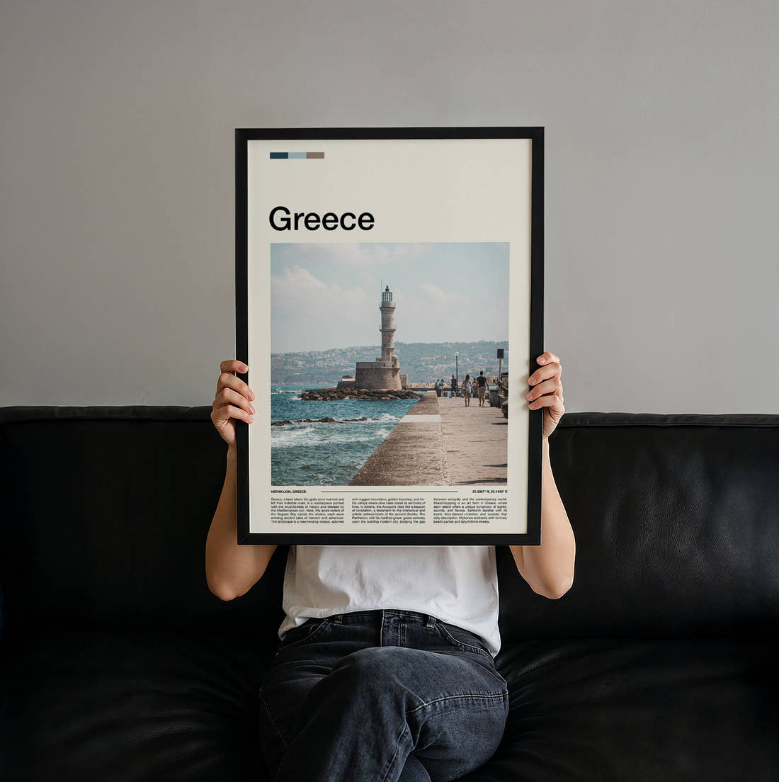 Greece Lighthouse On The Pier Travel Print held up by hand to show the size of the print