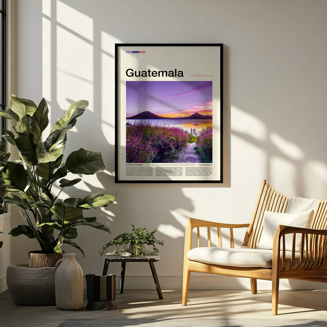 Guatemala Volcanoes Across The Lake Travel Print framed on a pale wall beside houseplants
