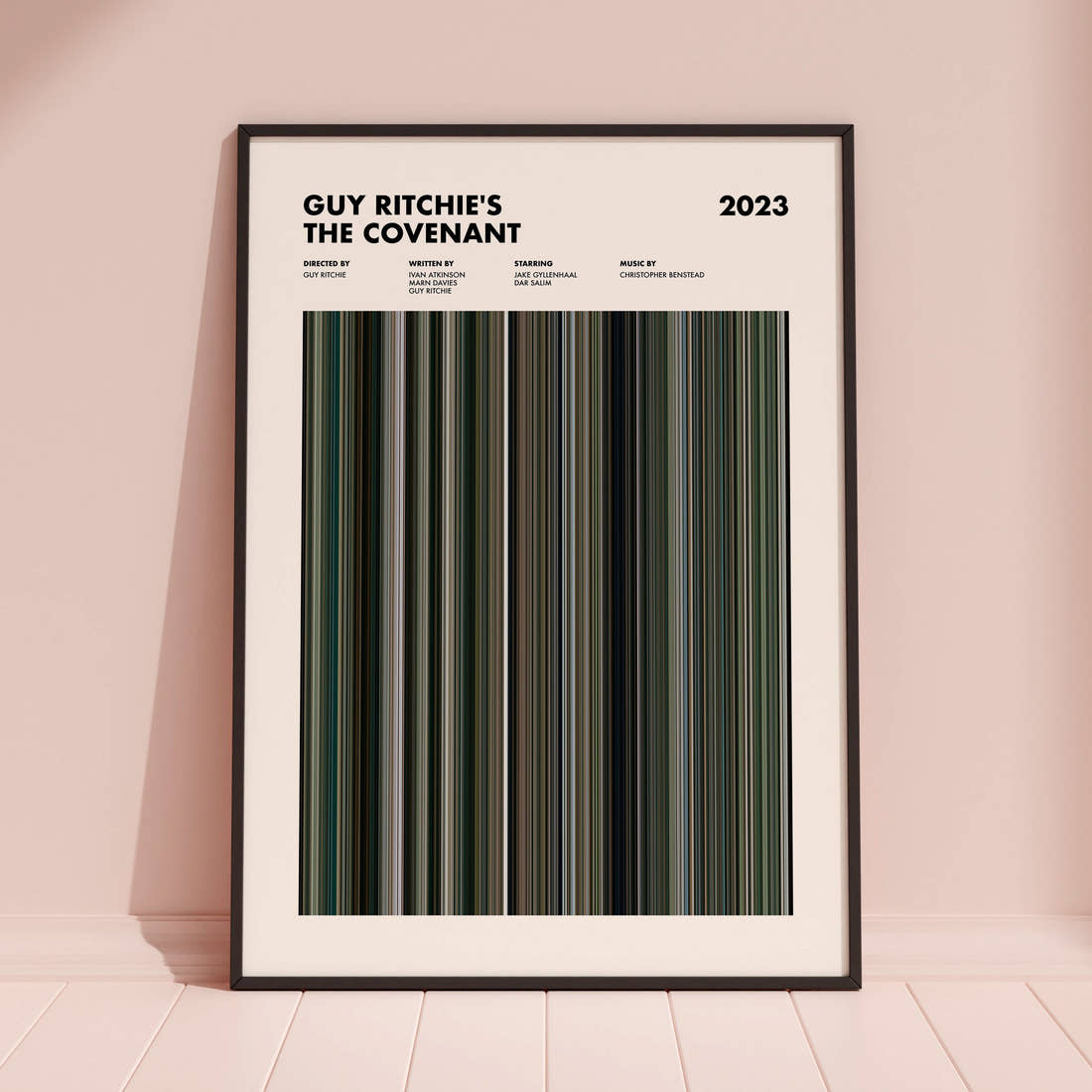 Guy Ritchie's The Covenant Movie Barcode Poster framed and leaning against a coloured wall