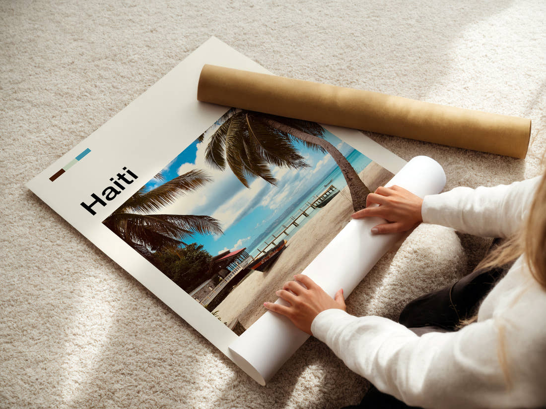 Haiti Palm-Fringed Beach Pier Travel Print being unrolled from its postal tube