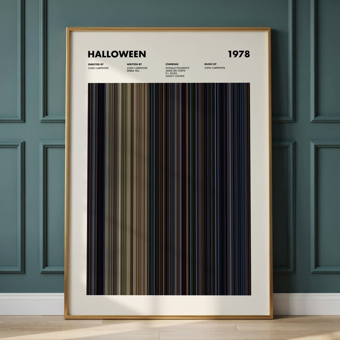 Halloween Movie Barcode Poster framed and leaning against a panelled wall