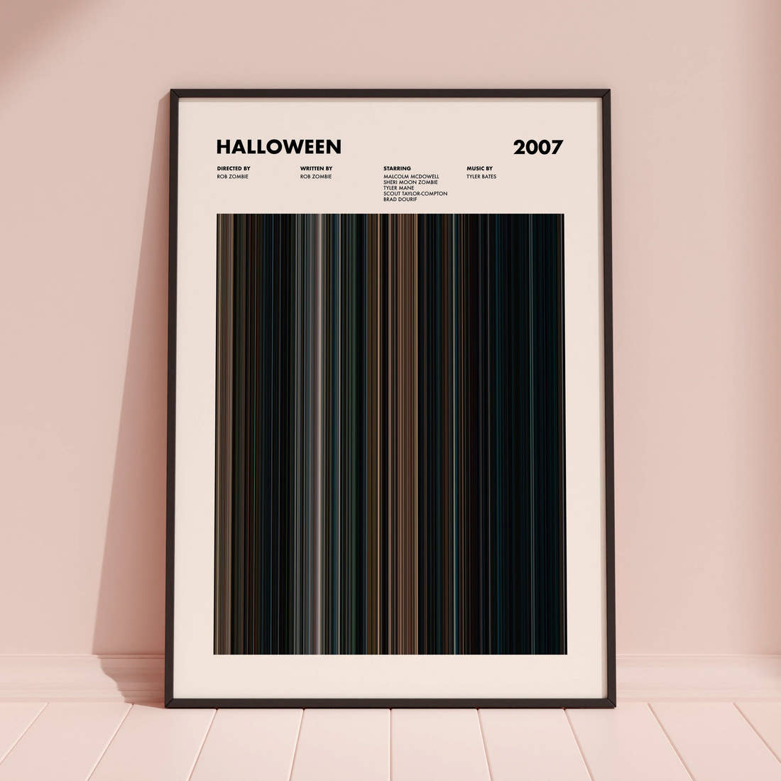 Halloween (2007) Movie Barcode Poster framed and leaning against a coloured wall
