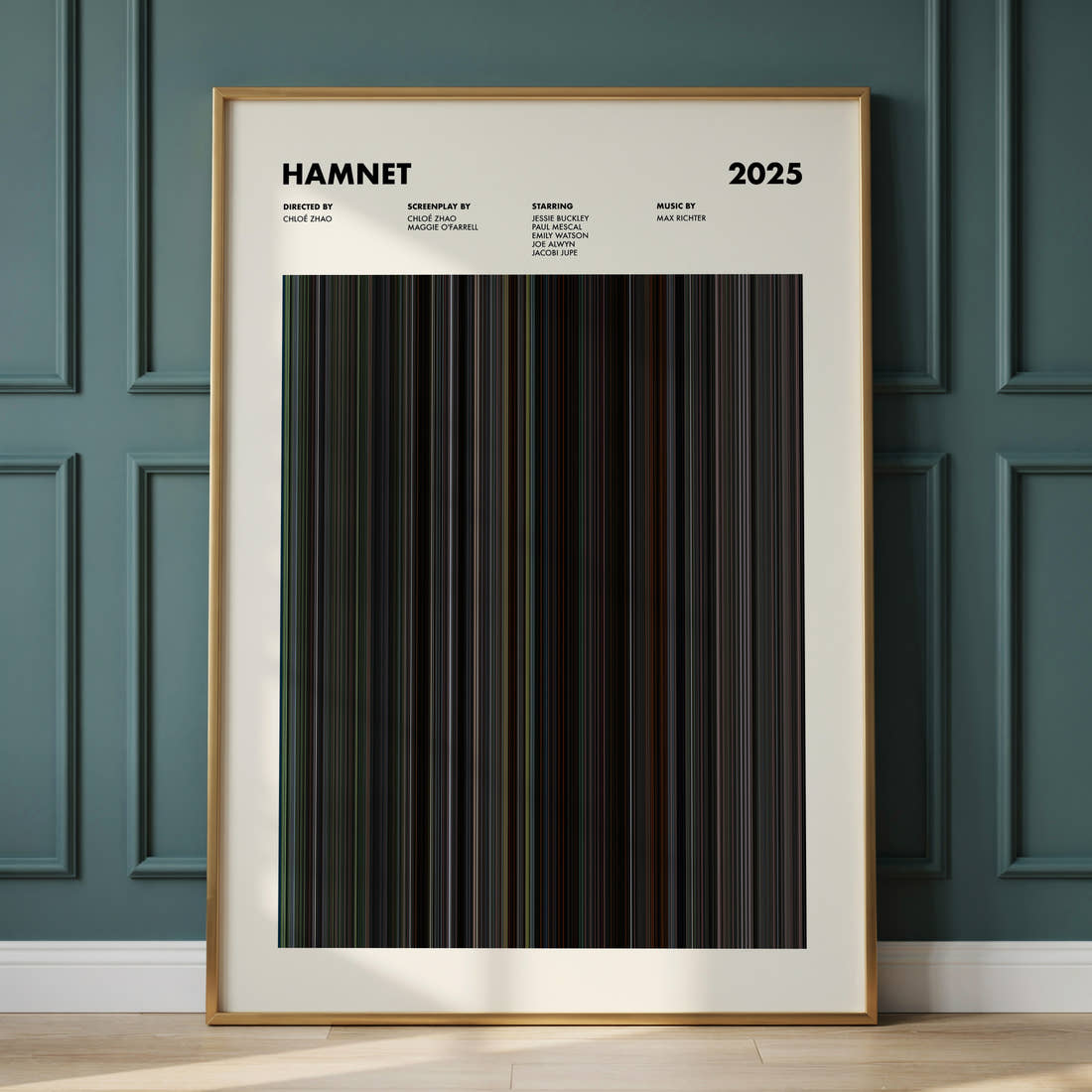 Hamnet Movie Barcode Poster framed and leaning against a panelled wall