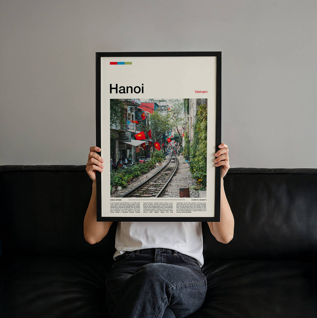 Hanoi Train Street Travel Print held up by hand to show the size of the print