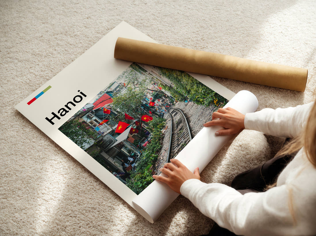 Hanoi Train Street Travel Print being unrolled from its postal tube