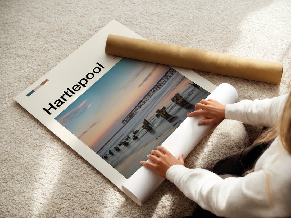 Hartlepool Pier At Dusk Travel Print being unrolled from its postal tube