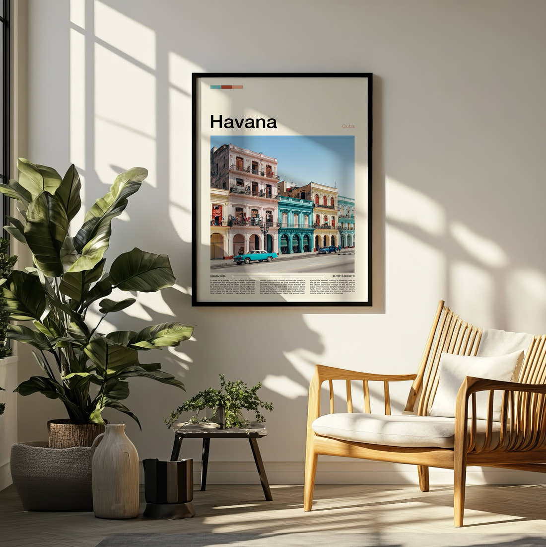 Havana Colourful Colonial Buildings Travel Print framed on a pale wall beside houseplants