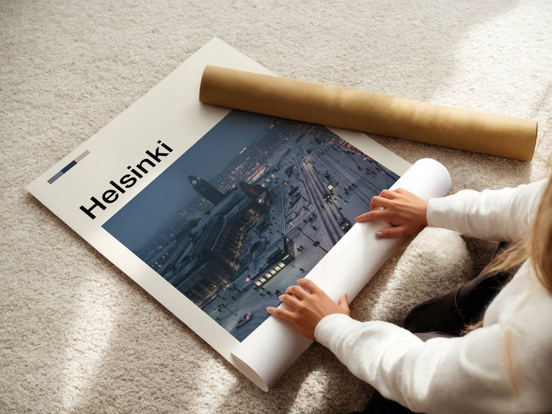 Helsinki Snowy City Square Travel Print being unrolled from its postal tube