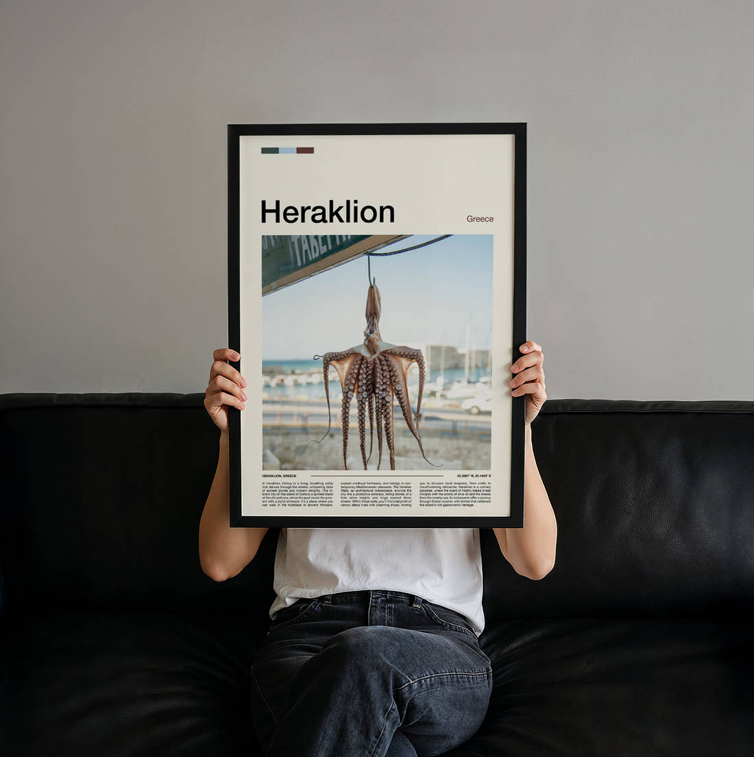 Heraklion Octopus Drying Travel Print held up by hand to show the size of the print