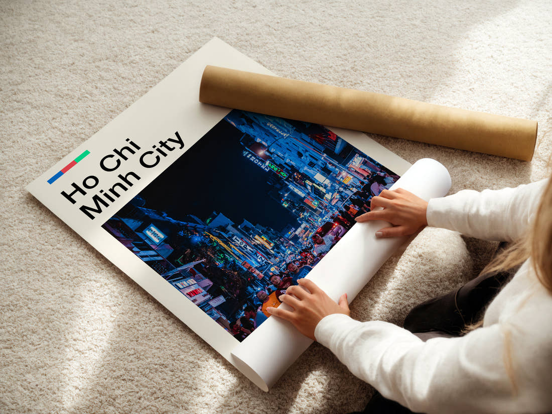 Ho Chi Minh City Neon Street At Night Travel Print being unrolled from its postal tube