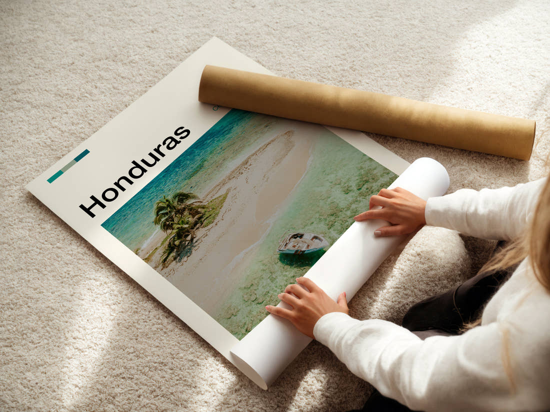 Honduras Sandbank With Palm Tree Travel Print being unrolled from its postal tube