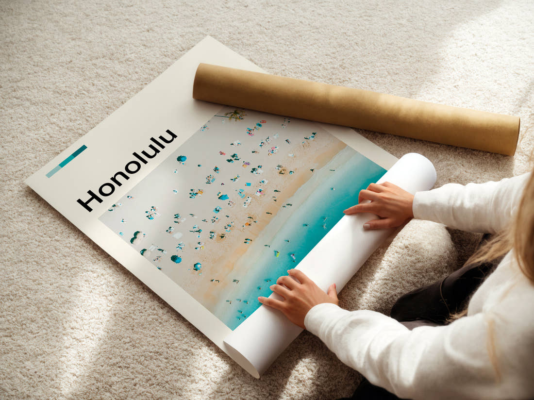 Honolulu Beach Umbrellas From Above Travel Print being unrolled from its postal tube