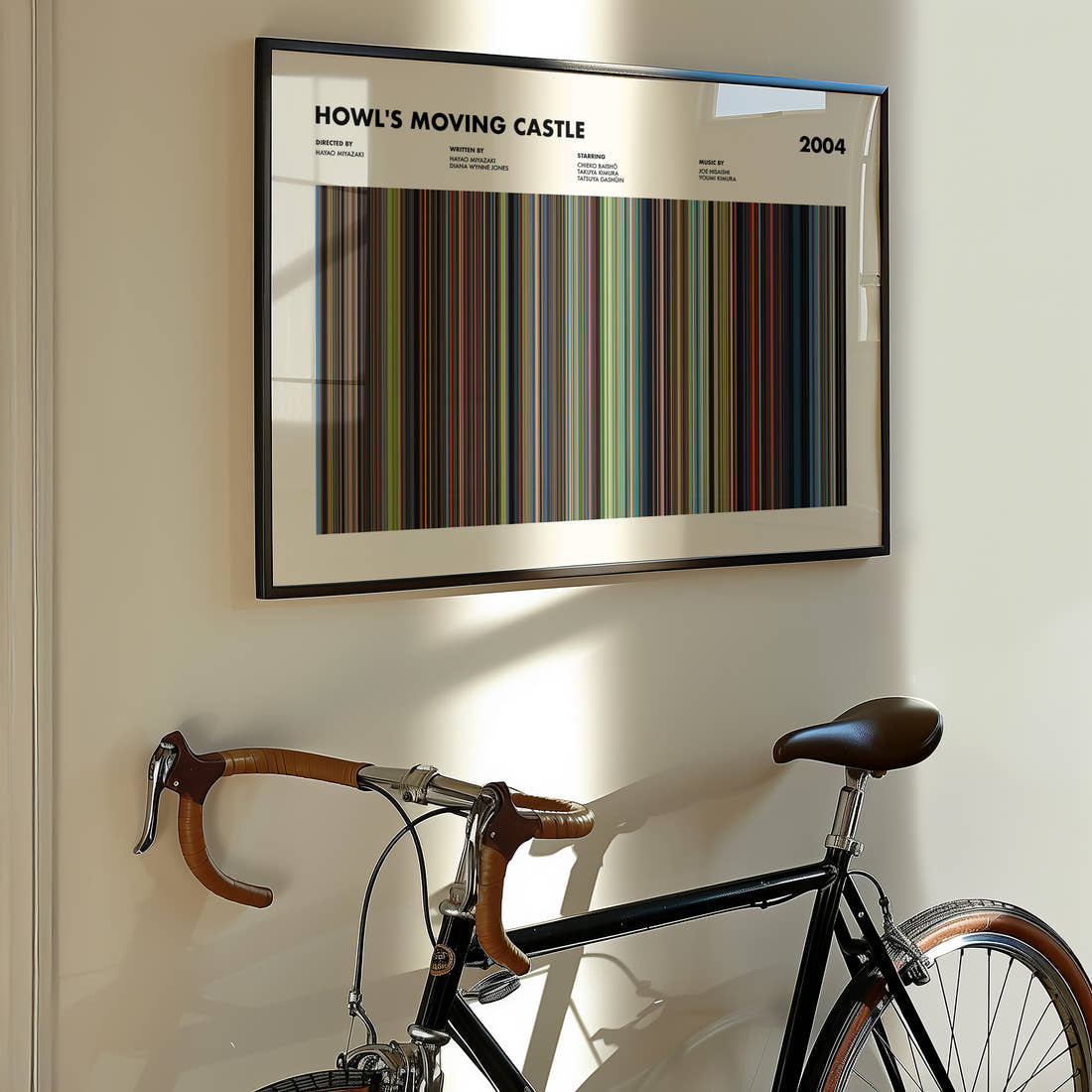 Howl's Moving Castle Movie Barcode Poster framed on the wall of a styled room setting