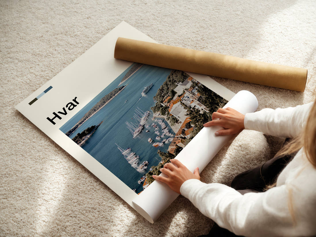 Hvar Harbour From Above Travel Print being unrolled from its postal tube