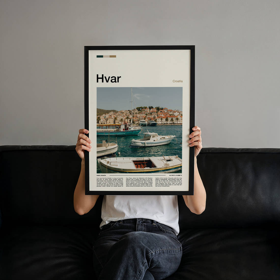 Hvar Harbour Boats View Travel Print held up by hand to show the size of the print