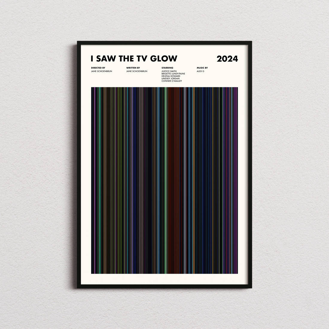 I Saw the TV Glow Movie Barcode Poster framed on a plain studio wall