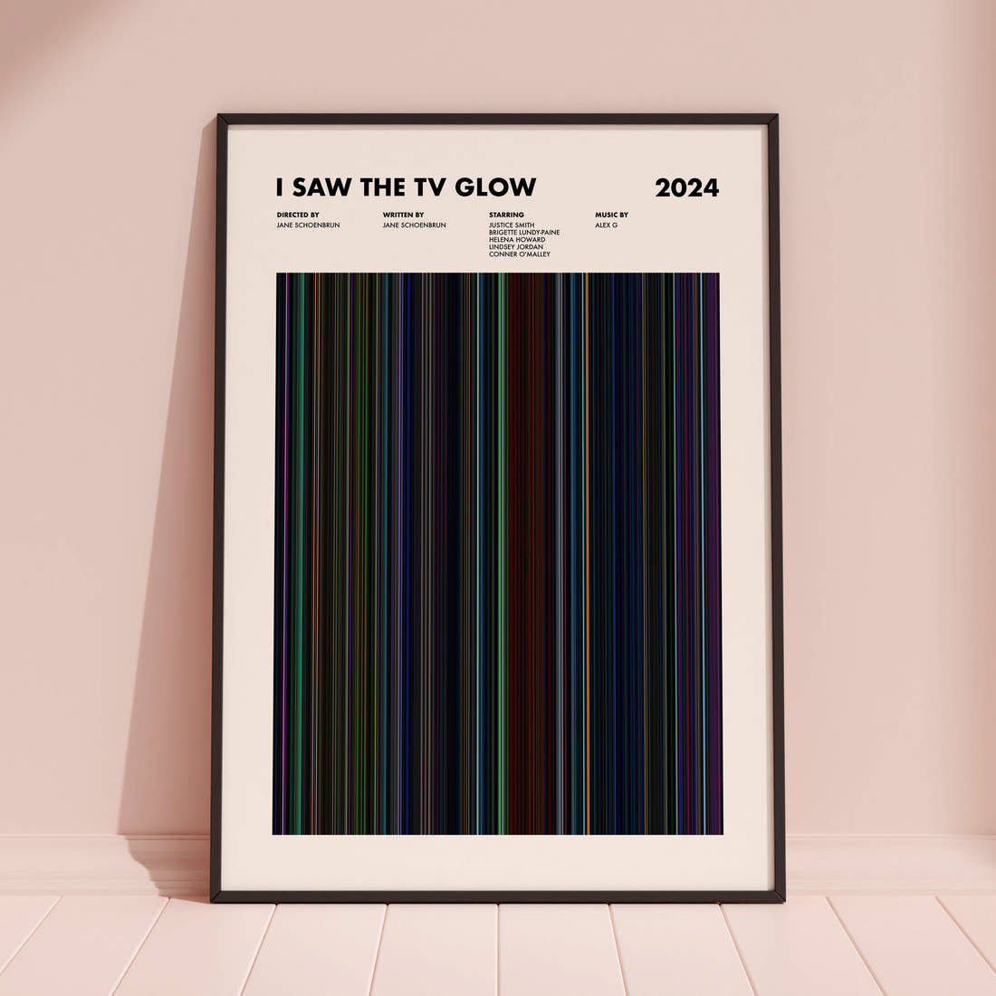 I Saw the TV Glow Movie Barcode Poster framed and leaning against a coloured wall
