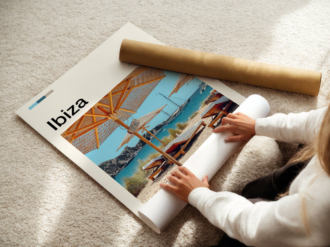 Ibiza Sun Loungers And Parasols Travel Print being unrolled from its postal tube