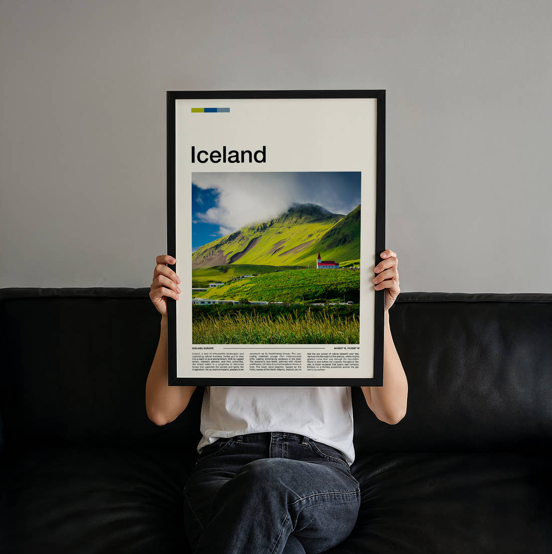 Iceland Church On Green Hillside Travel Print held up by hand to show the size of the print
