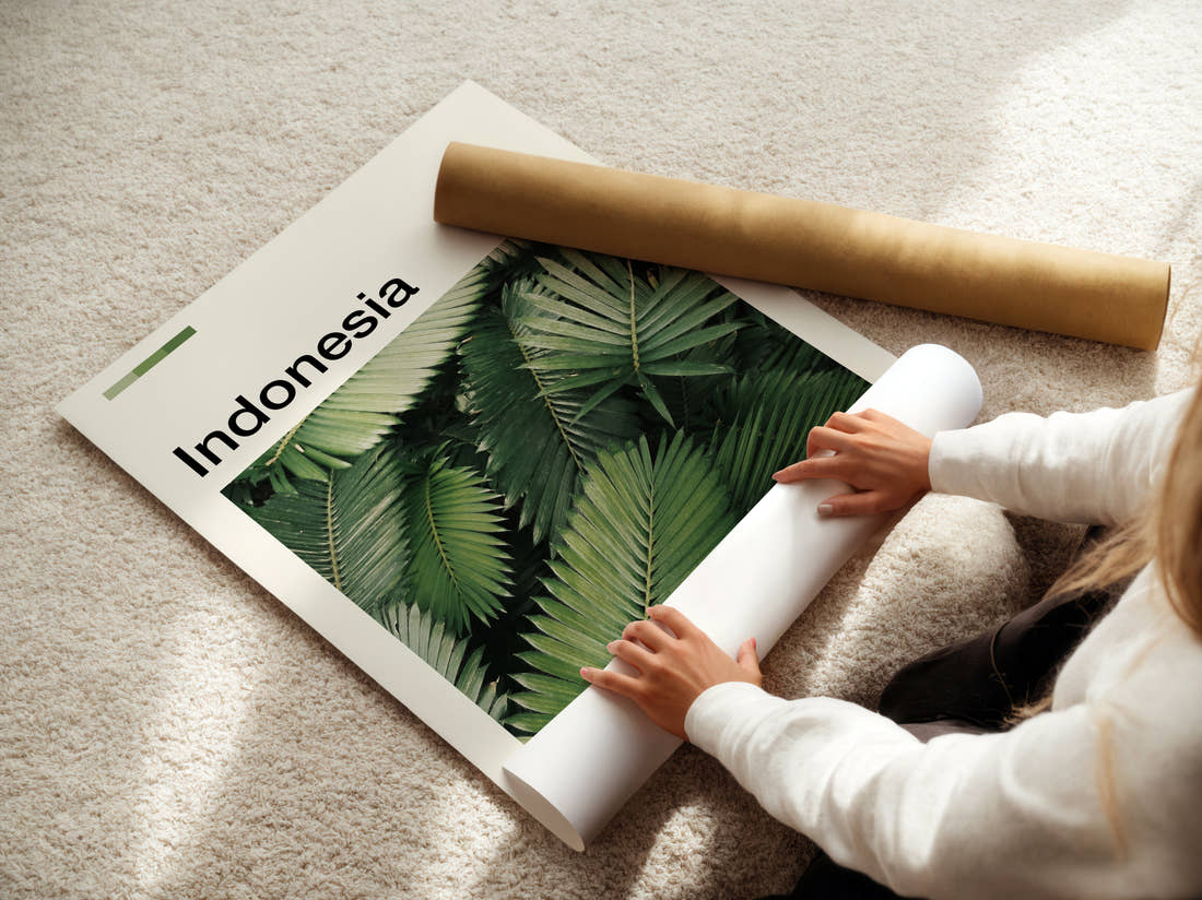 Indonesia Palm Leaves Travel Print being unrolled from its postal tube