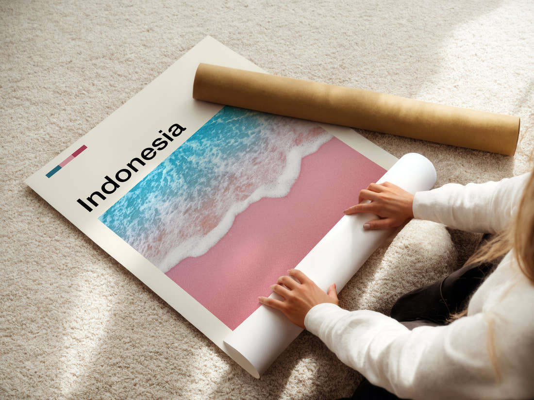 Indonesia Pink Sand Beach Travel Print being unrolled from its postal tube