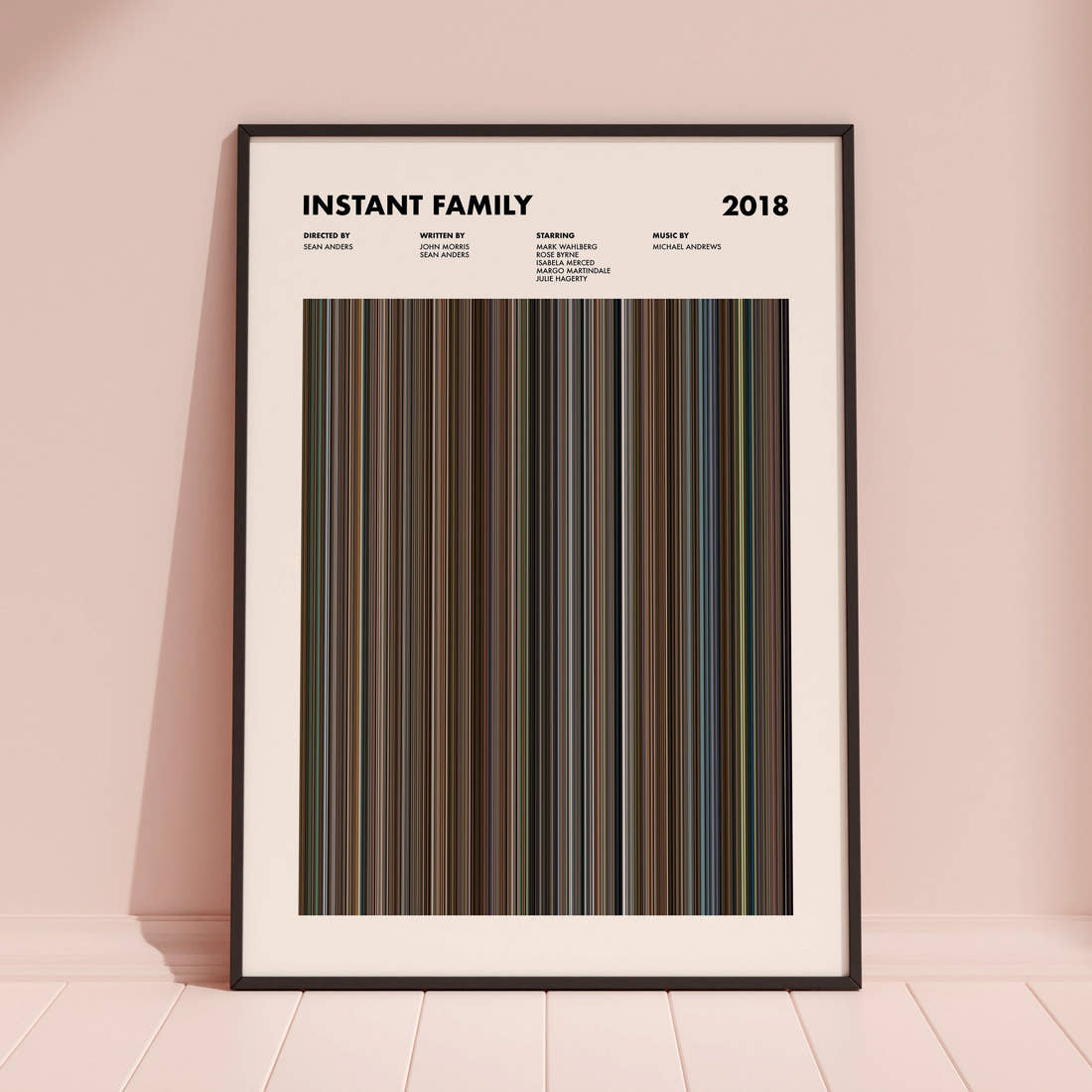 Instant Family Movie Barcode Poster framed and leaning against a coloured wall
