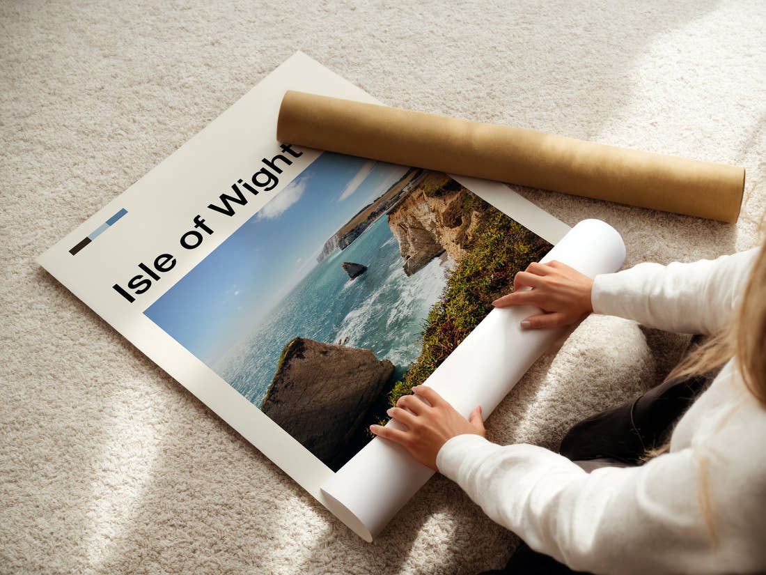 Isle of Wight Chalk Cliffs And Stack Travel Print being unrolled from its postal tube