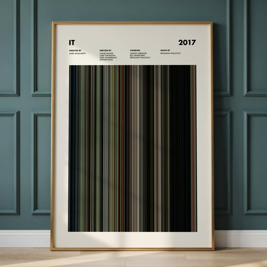 It Movie Barcode Poster framed and leaning against a panelled wall