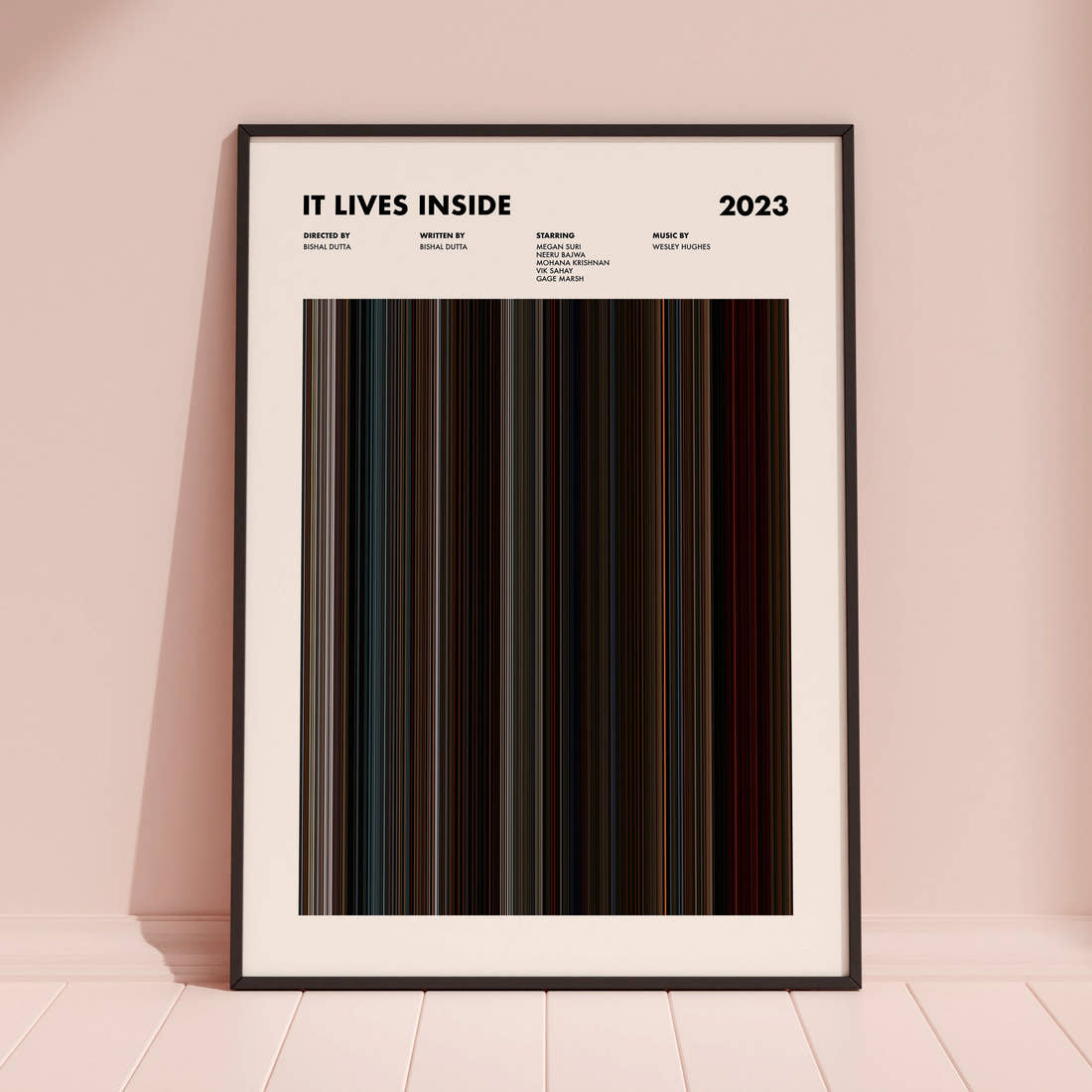 It Lives Inside Movie Barcode Poster framed and leaning against a coloured wall