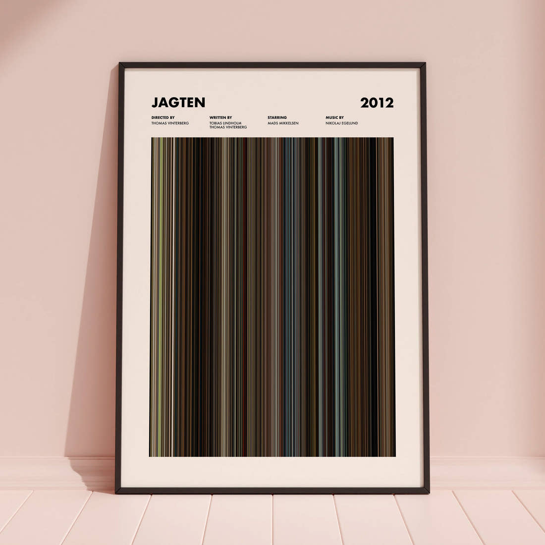 Jagten Movie Barcode Poster framed and leaning against a coloured wall