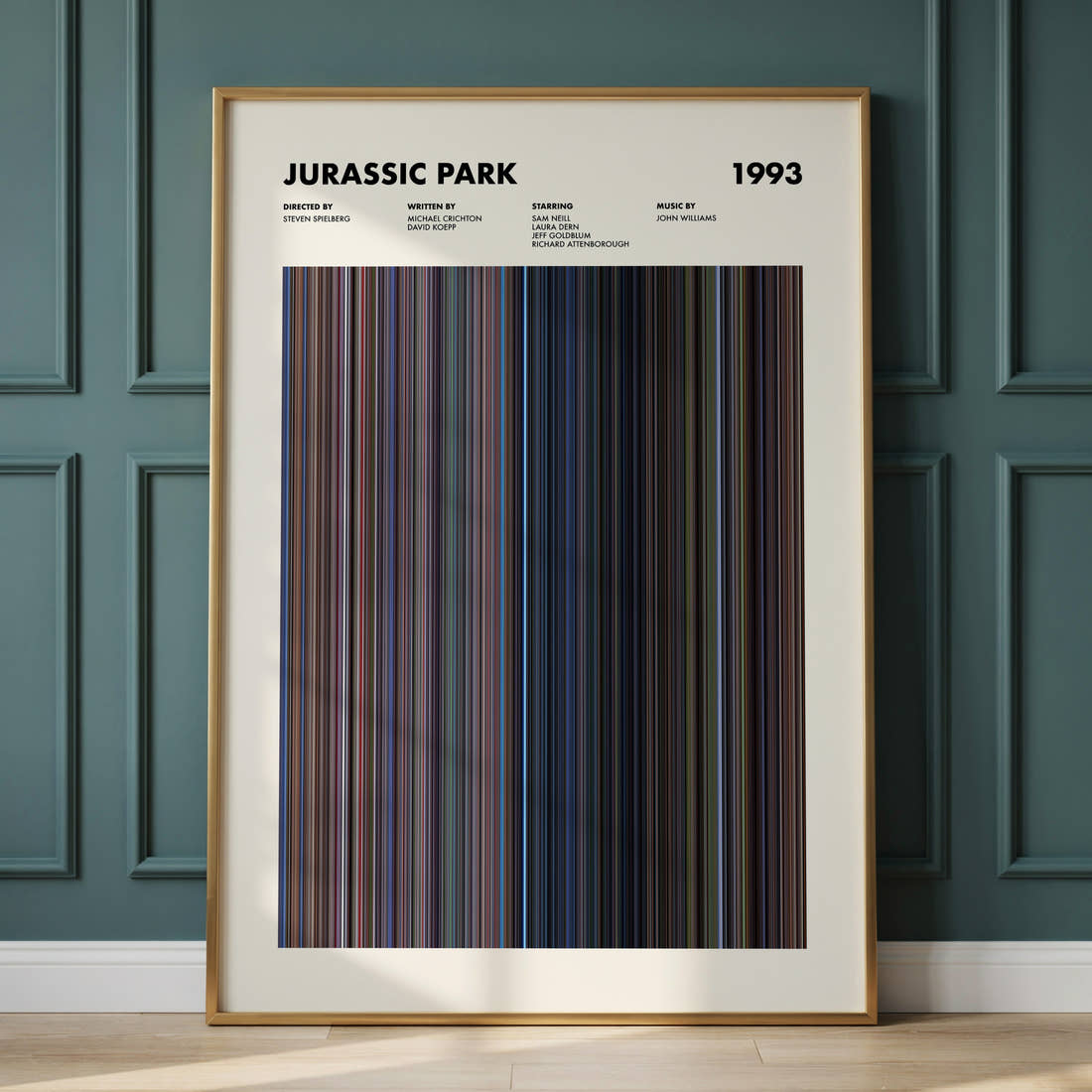 Jurassic Park Movie Barcode Poster framed and leaning against a panelled wall