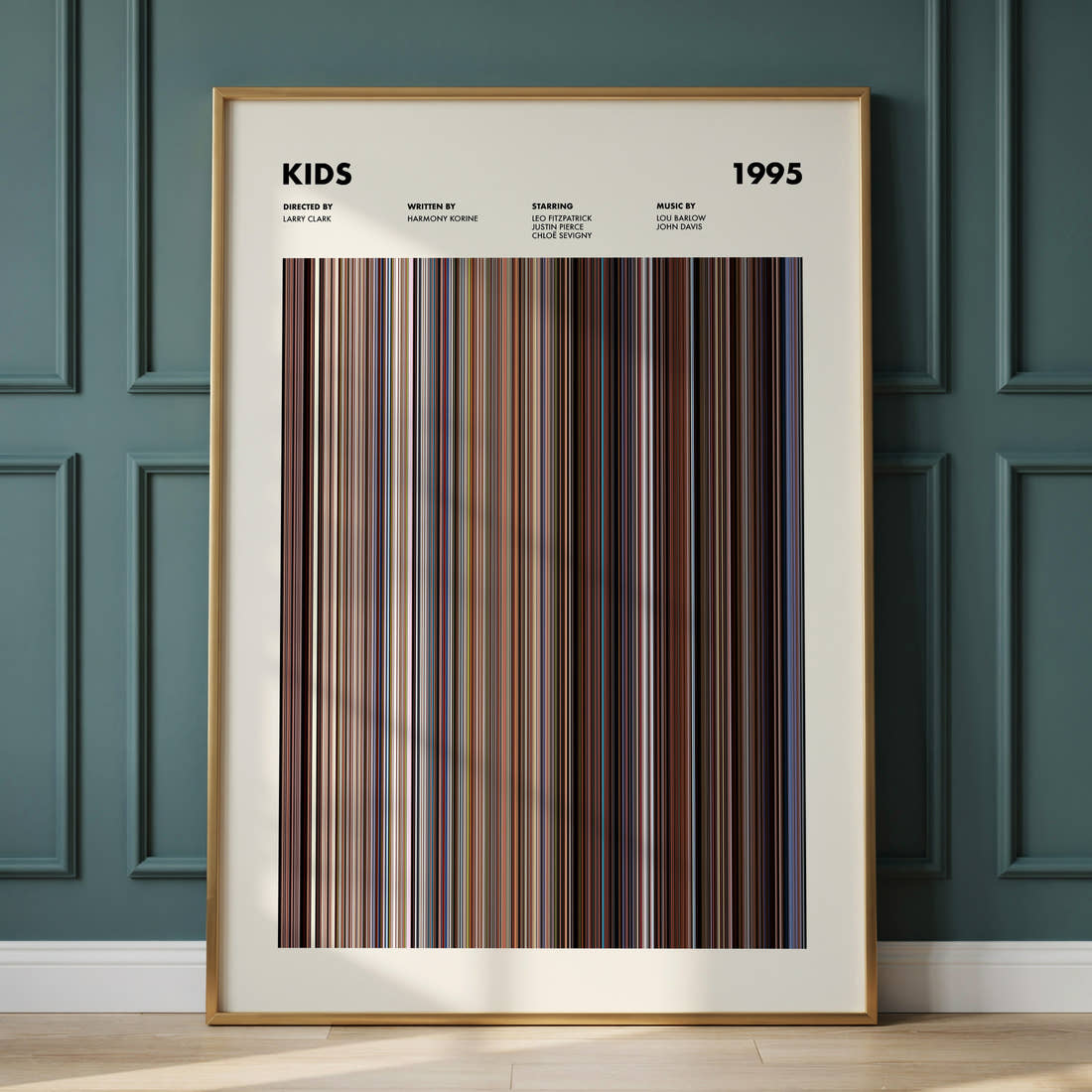 Kids Movie Barcode Poster framed and leaning against a panelled wall