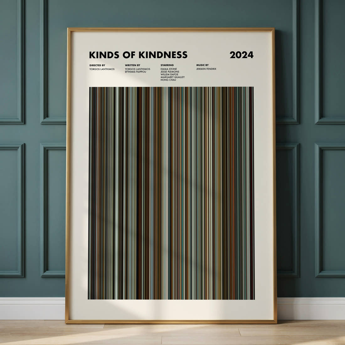 Kinds of Kindness Movie Barcode Poster framed and leaning against a panelled wall