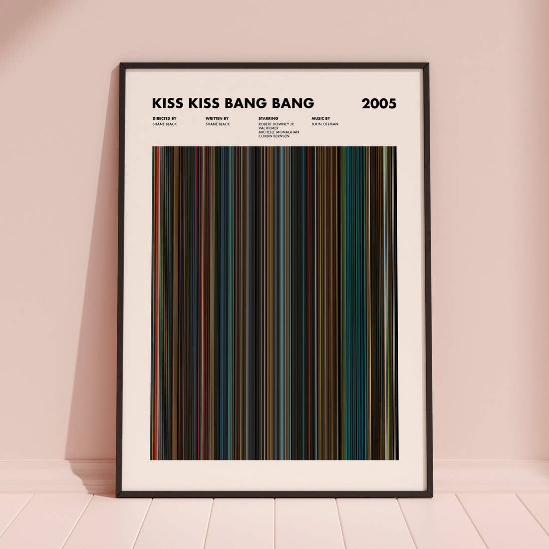 Kiss Kiss Bang Bang Movie Barcode Poster framed and leaning against a coloured wall