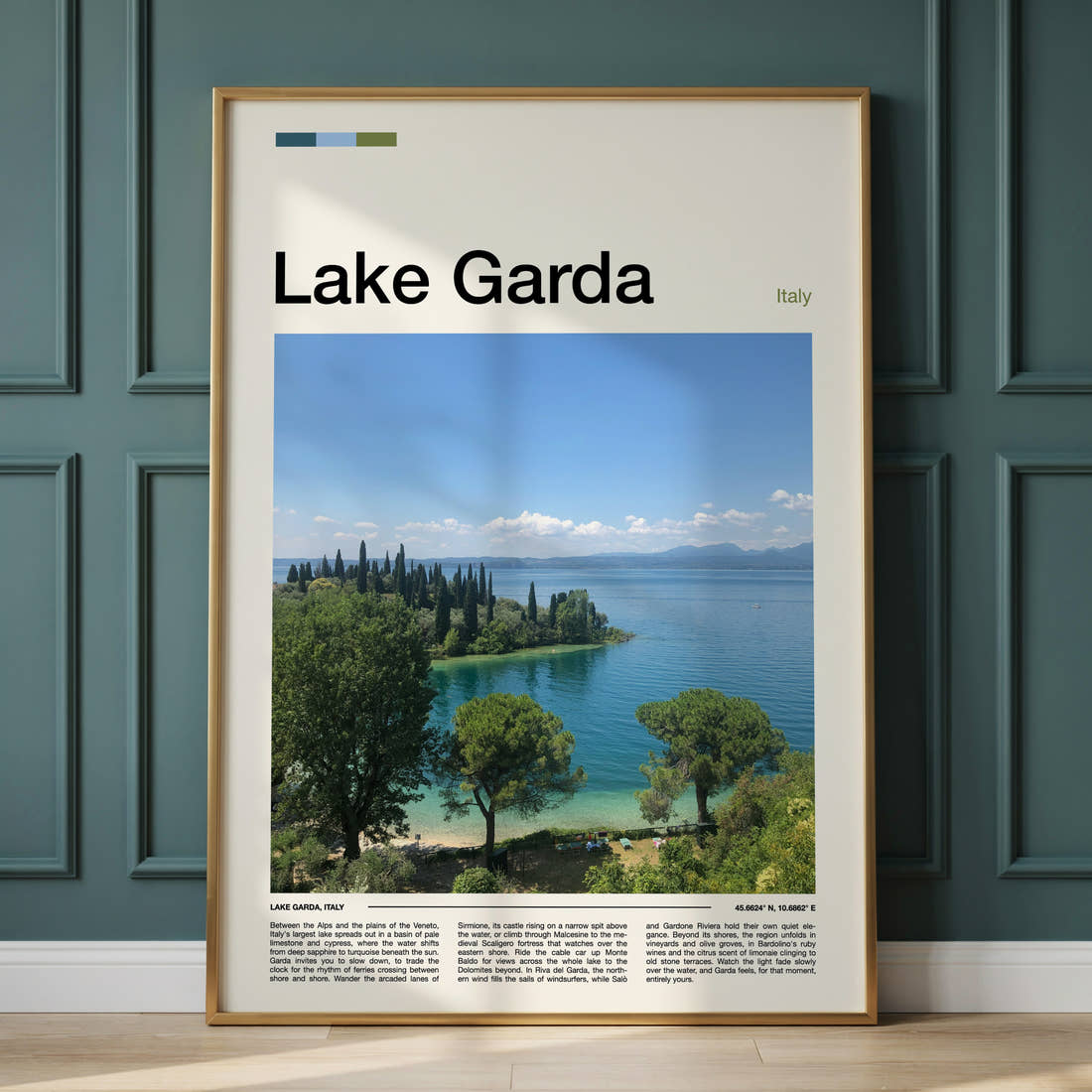 Lake Garda Cypress Lined Shoreline Travel Print framed on the wall of a calm, neutral bedroom