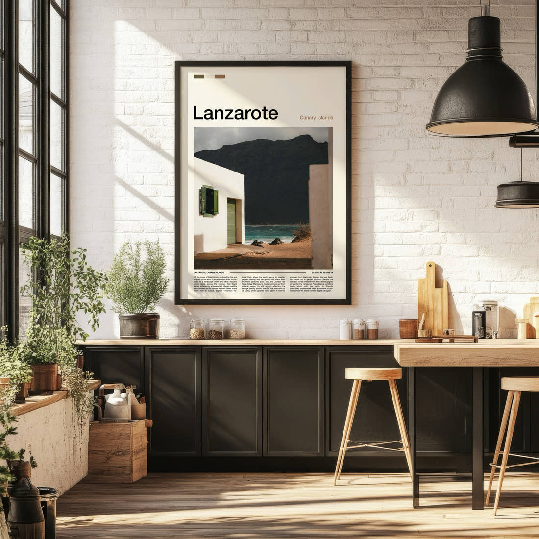 Lanzarote Whitewashed House, Volcanic Cliff Travel Print framed on the wall of a bright kitchen and dining space