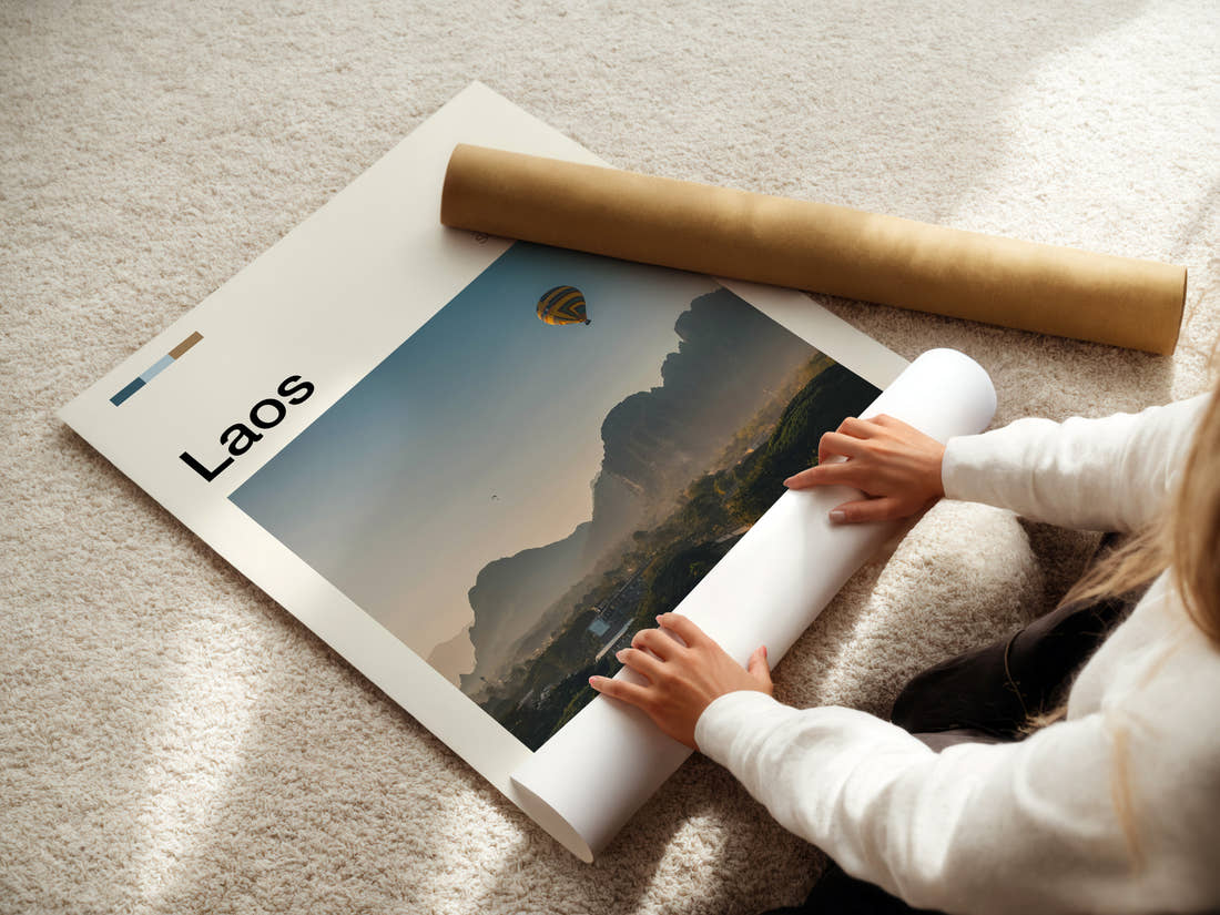 Laos Hot Air Balloon At Dawn Travel Print being unrolled from its postal tube
