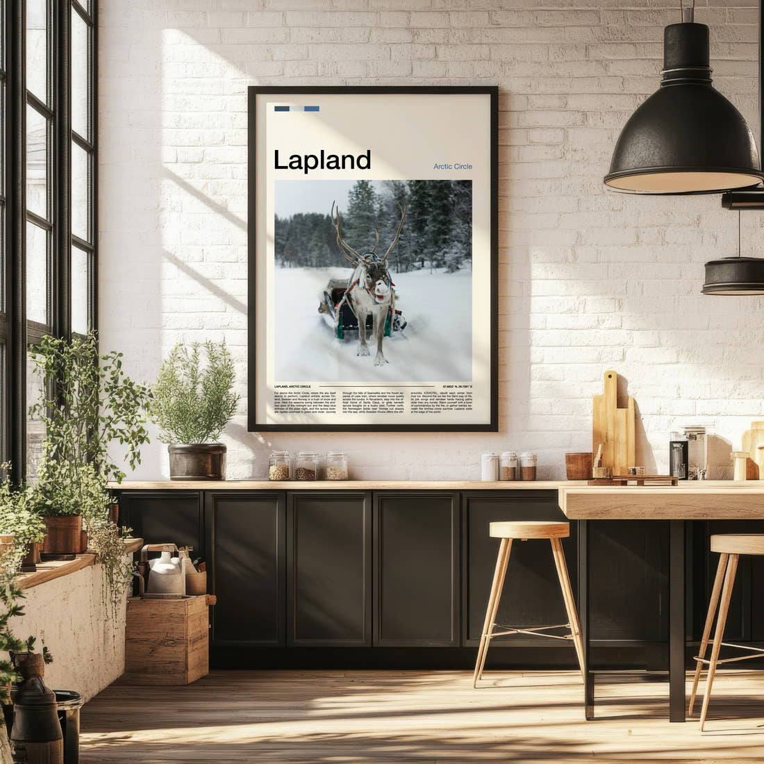 Lapland Reindeer And Sleigh Travel Print framed on the wall of a bright kitchen and dining space