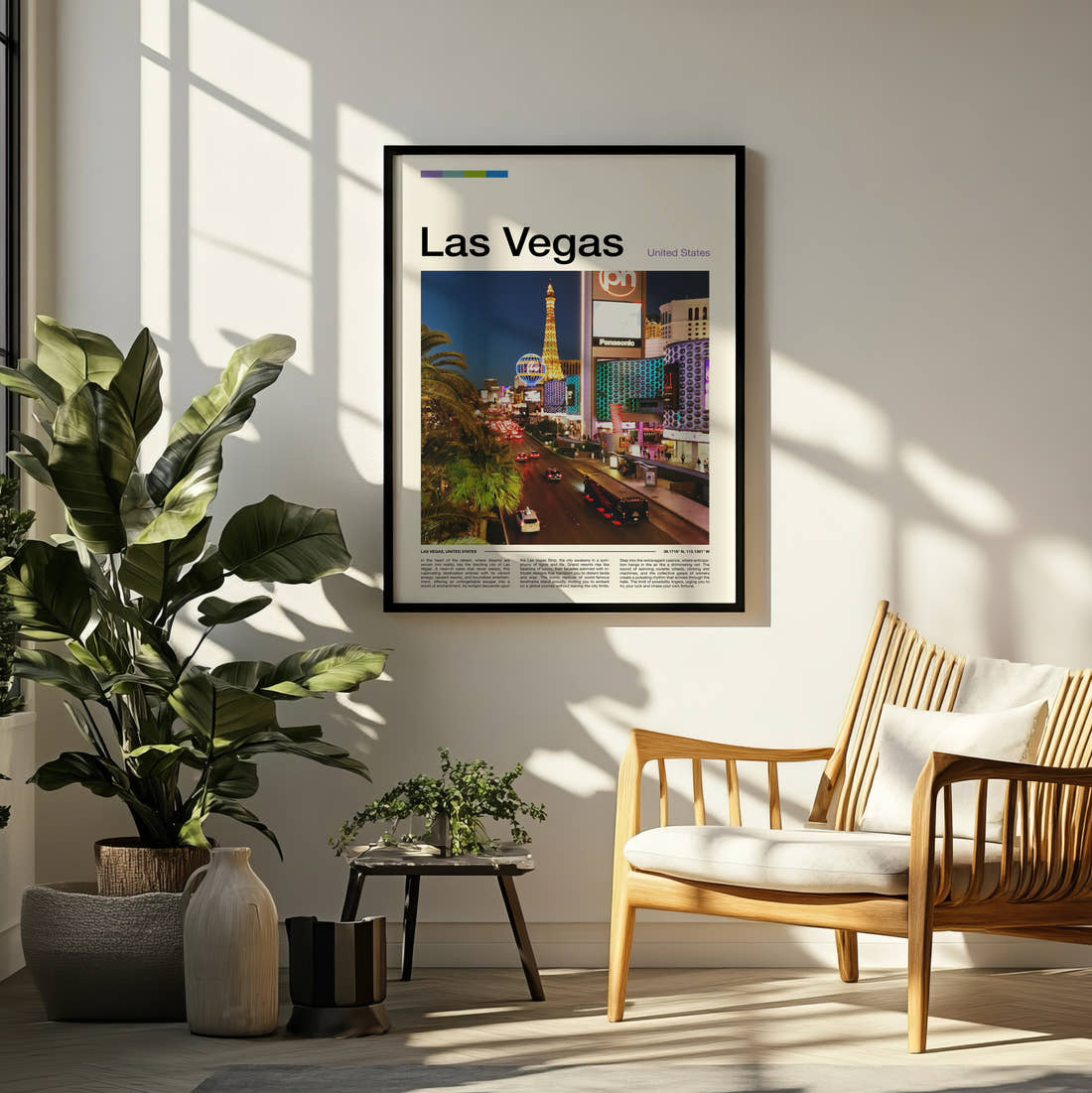 Las Vegas The Strip At Night Travel Print framed on a pale wall beside houseplants