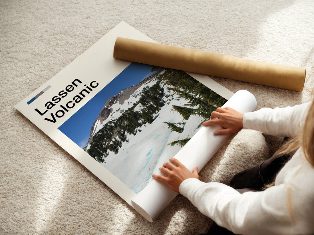 Lassen Volcanic Snowy Peak And Pines Travel Print being unrolled from its postal tube