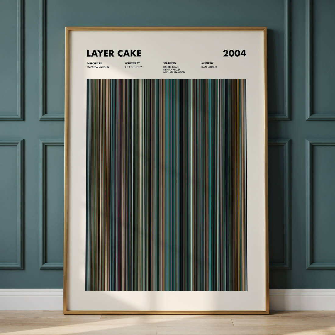 Layer Cake Movie Barcode Poster framed and leaning against a panelled wall
