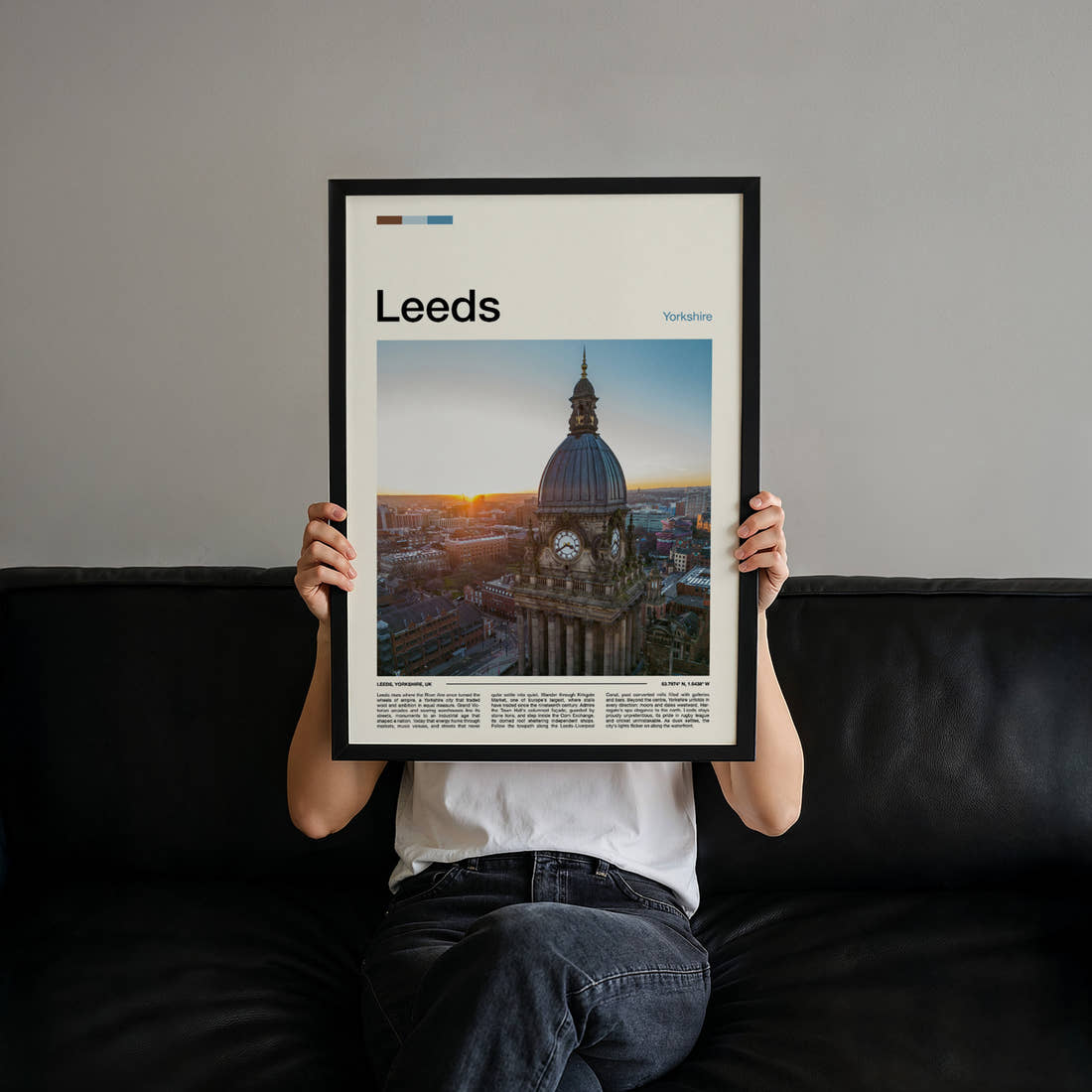 Leeds Clock Tower At Sunset Travel Print held up by hand to show the size of the print