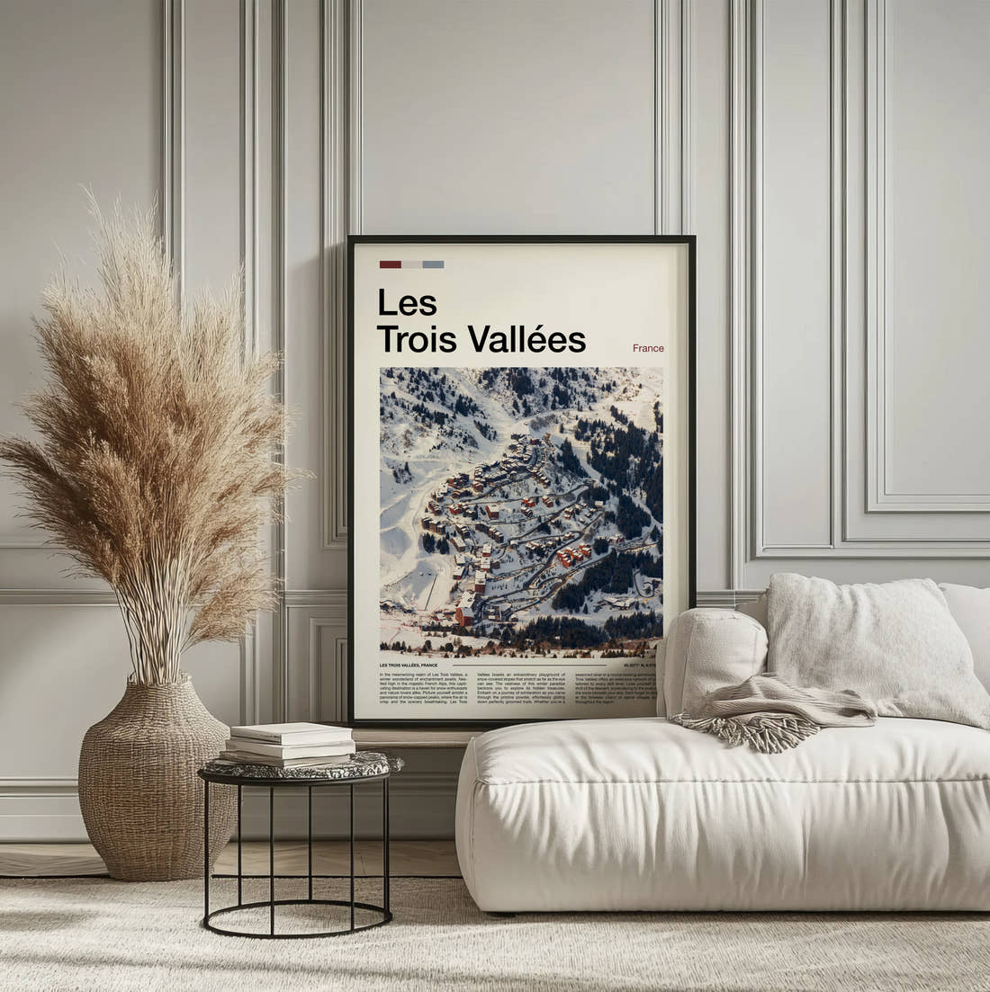 Les Trois Vallees Snowy Ski Village Travel Print framed on the wall of a calm, neutral bedroom