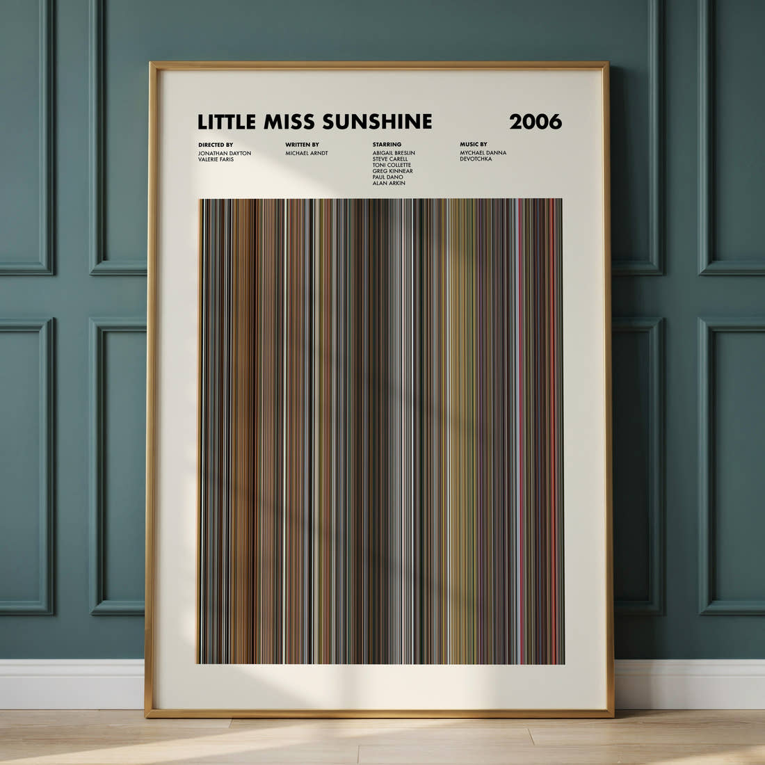 Little Miss Sunshine Movie Barcode Poster framed and leaning against a panelled wall