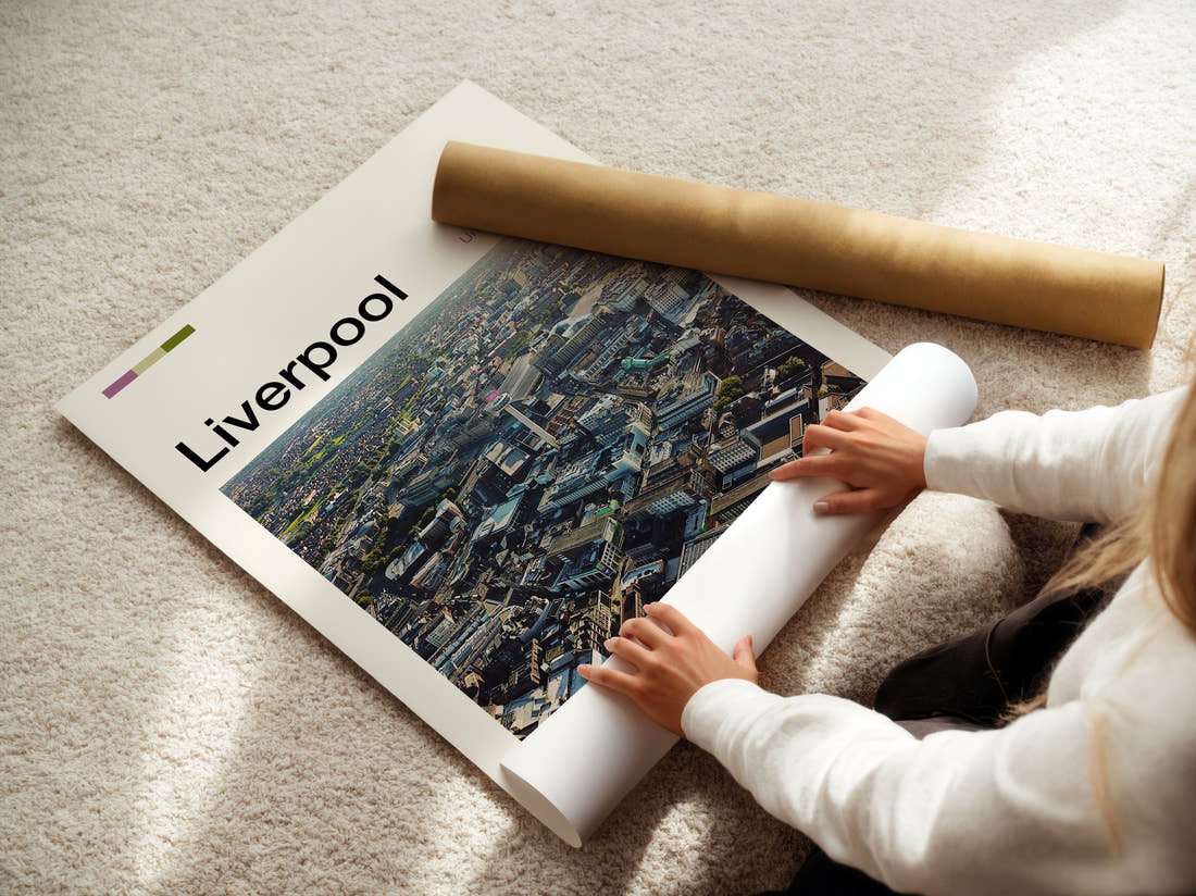 Liverpool Aerial View Of Rooftops Travel Print being unrolled from its postal tube
